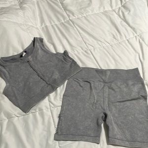 Grey workout set, both stretchy yet tight fit
